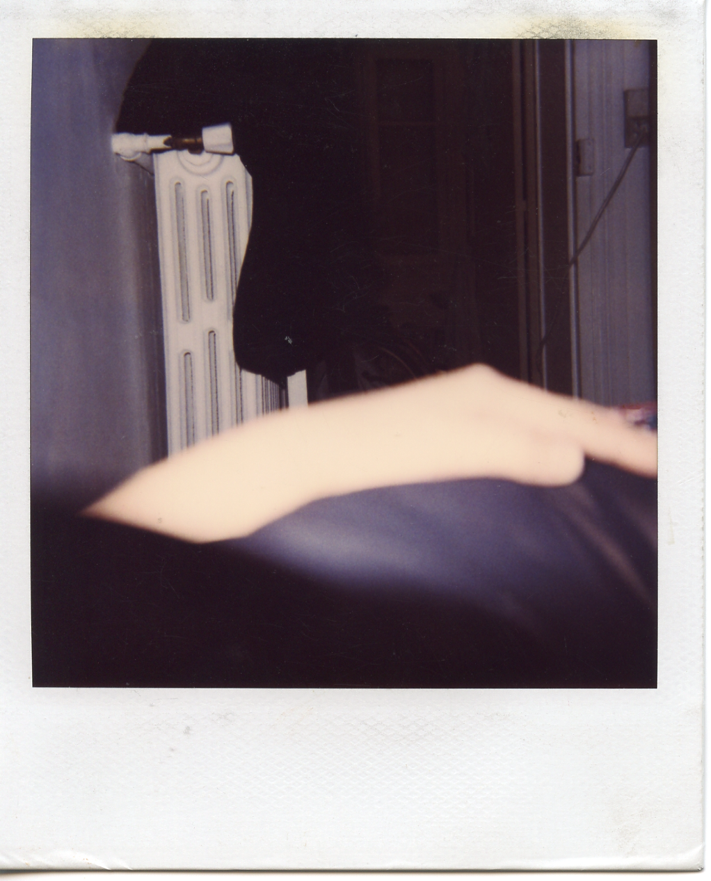My hip and hand in my apartment in Paris. I loved those radiators.