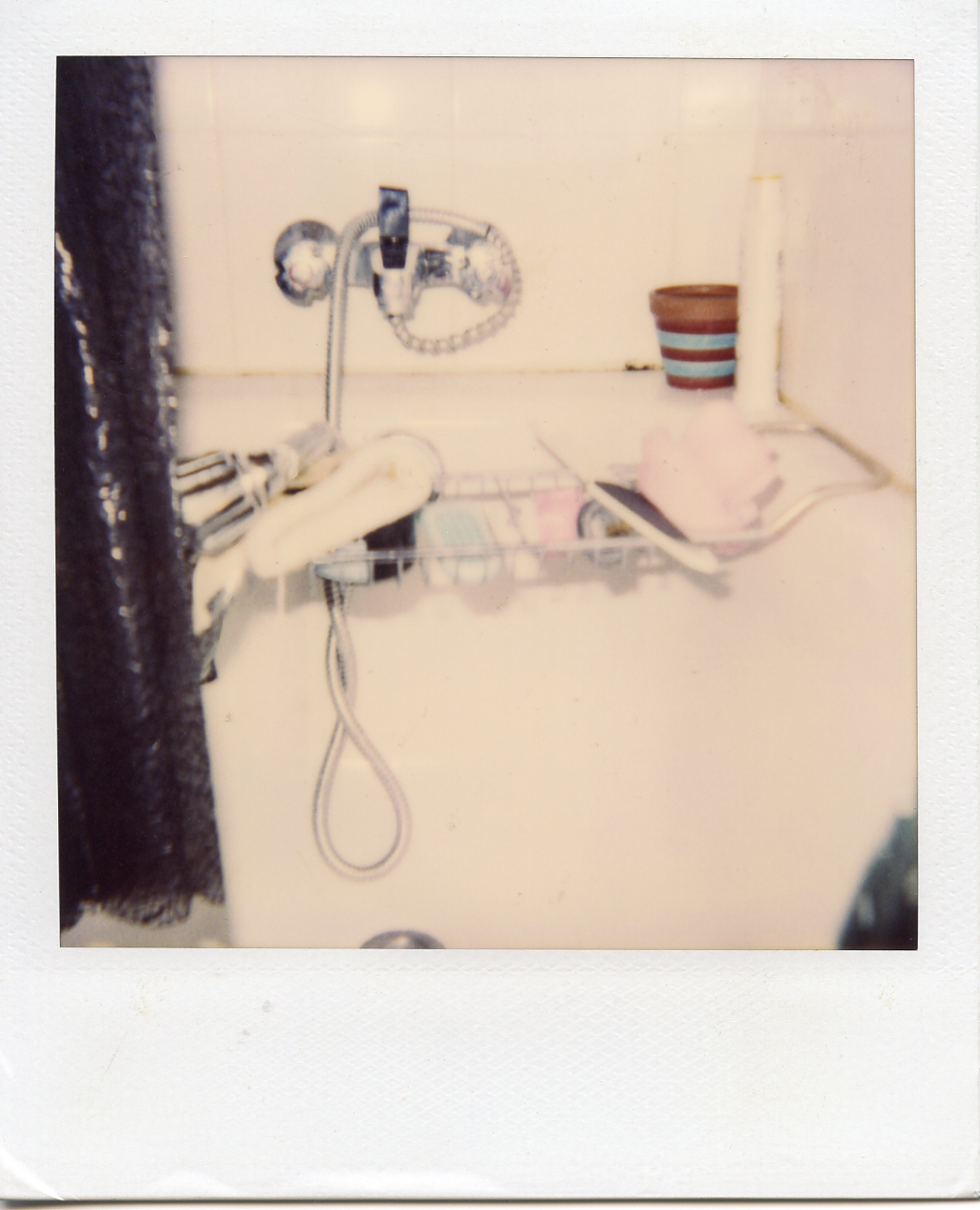 My bathtub in Paris. Black and textured shower curtain.