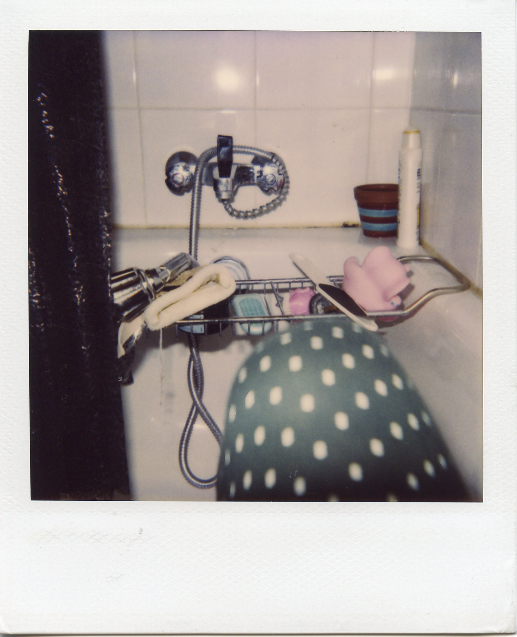 My knee, in my pyjamas in the bathtub, Paris. 